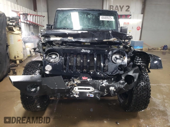 2015 Jeep Wrangler Unlimited Rubicon Hard Rock with VIN 1C4HJWFG4FL676868, listed as a Copart auction lot 48489525 with 100,771 mi miles and Salvage title. Bid and sale history available at DreamBid. Image 5.
