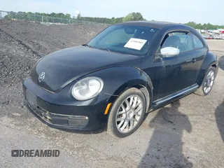 2013 Volkswagen Beetle 2.5L with VIN 3VWJP7AT1DM608370, listed as a IAAI auction lot 42088900 with Not Provided miles and . Bid and sale history available at DreamBid. Image 2.