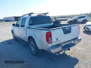 2012 Nissan Frontier SL with VIN 1N6AD0ER3CC451455, listed as a IAAI auction lot 41944964 with 143,054 mi miles and . Bid and sale history available at DreamBid. Image 3.