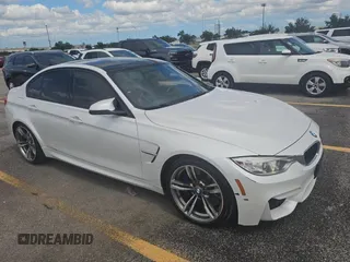 2015 BMW M3 z VIN WBS3C9C57FP803591, wystawiony jako Copart lot #59972975 z przebiegiem 183 051 mil mil oraz Tytuł czysty. Historia ofert i sprzedaży dostępna na DreamBid. Obrazek 1.
