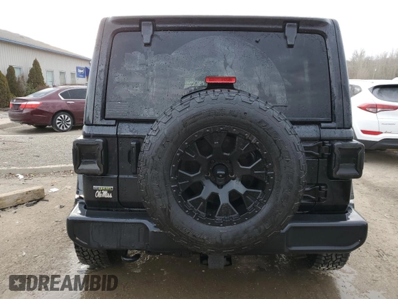 2021 Jeep Wrangler Unlimited Willys with VIN 1C4HJXDM6MW823301, listed as a Copart auction lot 43021265 with 59,707 mi miles and Salvage Title. Bid and sale history available at DreamBid. Image 6.