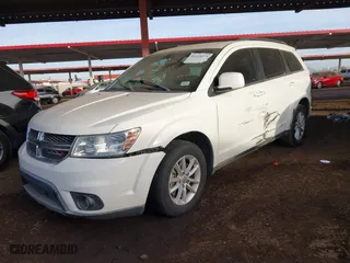 2013 Dodge Journey SXT with VIN 3C4PDCBG0DT701676, listed as a IAAI auction lot 41214275 with 144,196 mi miles. Bid and sale history available at carsss.com. Image 17.