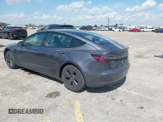 2023 Tesla Model 3 with VIN 5YJ3E1EA3PF623114, listed as a IAAI auction lot 41710385 with 31,663 mi miles and . Bid and sale history available at carsss.com. Image 3.
