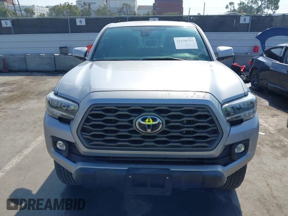 2020 Toyota Tacoma SR5 with VIN 3TMAZ5CN7LM138859, listed as a IAAI auction lot 42150725 with 36,462 mi miles and . Bid and sale history available at DreamBid. Image 6.
