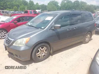2008 Honda Odyssey EX-L with VIN 5FNRL38778B402015, listed as a IAAI auction lot 42252070 with 349,317 mi miles and . Bid and sale history available at DreamBid. Image 2.