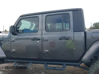 2023 Jeep Gladiator Sport S z VIN 1C6HJTAG9PL554845, wystawiony jako IAAI lot #41312360 z przebiegiem 18 077 mil mil oraz . Historia ofert i sprzedaży dostępna na DreamBid. Obrazek 15.
