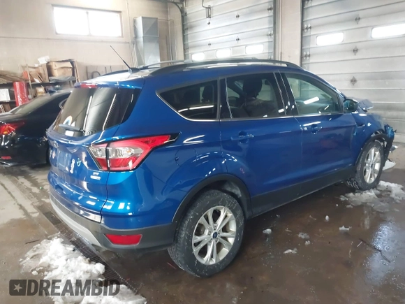 2018 Ford Escape SE z VIN 1FMCU9GD1JUB80500, wystawiony jako IAAI lot #41613294 z przebiegiem 112 187 mil mil oraz . Historia ofert i sprzedaży dostępna na DreamBid. Obrazek 4.