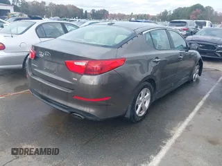 2015 Kia Optima LX with VIN 5XXGM4A72FG400848, listed as a IAAI auction lot 40802198 with 173,270 mi miles and . Bid and sale history available at DreamBid. Image 4.