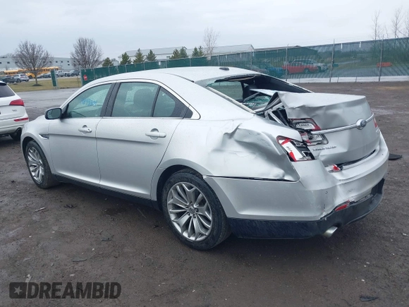 2014 Ford Taurus Limited with VIN 1FAHP2F81EG123933, listed as a IAAI auction lot 41843301 with 111,629 mi miles. Bid and sale history available at carsss.com. Image 3.