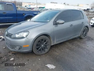 2012 Volkswagen Golf TDI with VIN WVWDM7AJ1CW205186, listed as a IAAI auction lot 41468253 with 150,991 mi miles and . Bid and sale history available at DreamBid. Image 16.