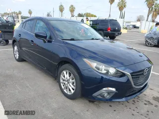 2016 Mazda Mazda3 i Grand Touring with VIN JM1BM1N74G1319656, listed as a IAAI auction lot 41561603 with 123,610 mi miles. Bid and sale history available at carsss.com. Image 1.