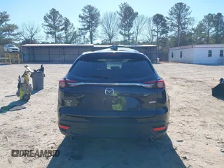 2018 Mazda CX-9 Grand Touring z VIN JM3TCADY5J0204845, wystawiony jako IAAI lot #41292695 z przebiegiem 98 751 mil mil oraz . Historia ofert i sprzedaży dostępna na DreamBid. Obrazek 16.