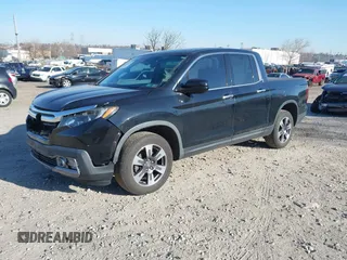 2019 Honda Ridgeline RTL-E with VIN 5FPYK3F7XKB033652, listed as a IAAI auction lot 41751421 with 96,774 mi miles and . Bid and sale history available at DreamBid. Image 2.
