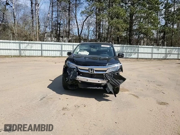 2019 Honda Pilot Touring 7-Passenger with VIN 5FNYF6H65KB092806, listed as a Copart auction lot 54205085 with 130,219 mi miles and Salvage title. Bid and sale history available at DreamBid. Image 15.
