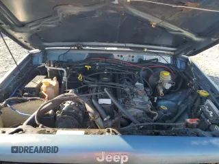 1998 Jeep Cherokee Sport with VIN 1J4FT68S0WL138603, listed as a Copart auction lot 86766454 with 0 mi miles and Salvage Title. Bid and sale history available at carsss.com. Image 12.
