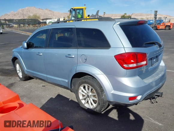 2013 Dodge Journey SXT with VIN 3C4PDCBG4DT584135, listed as a IAAI auction lot 41902149 with 165,700 mi miles and . Bid and sale history available at carsss.com. Image 3.