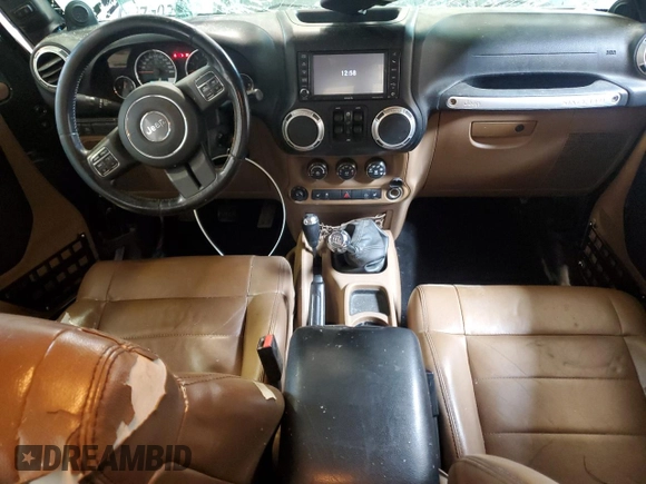 2012 Jeep Wrangler Unlimited Rubicon with VIN 1C4HJWFG4CL119390, listed as a Copart auction lot 60026425 with 305,189 mi miles and Salvage title. Bid and sale history available at DreamBid. Image 8.