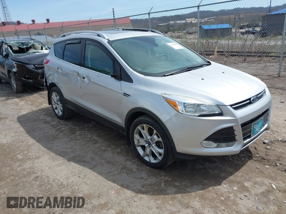 2016 Ford Escape Titanium with VIN 1FMCU9JX3GUA62802, listed as a IAAI auction lot 42001690 with 124,452 mi miles. Bid and sale history available at carsss.com. Image 1.