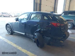 2018 Mazda CX-3 Grand Touring with VIN JM1DKFD77J0300612, listed as a IAAI auction lot 41322923 with 49,830 mi miles. Bid and sale history available at carsss.com. Image 3.