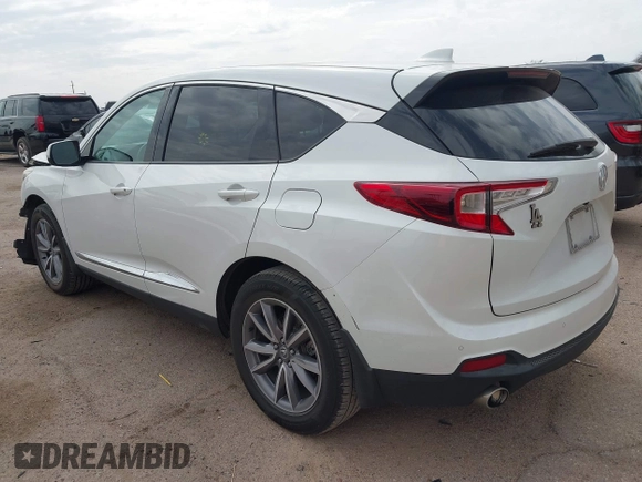 2021 Acura RDX w/Technology Package with VIN 5J8TC1H51ML022573, listed as a IAAI auction lot 41893265 with 56,516 mi miles. Bid and sale history available at carsss.com. Image 3.