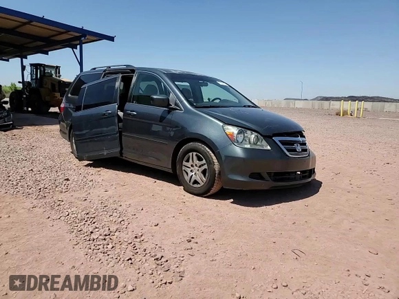 2006 Honda Odyssey EX with VIN 5FNRL384X6B461661, listed as a Copart auction lot 61051915 with 190,578 mi miles and Salvage title. Bid and sale history available at DreamBid. Image 14.