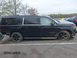 2018 Chevrolet Suburban LT z VIN 1GNSKHKC7JR382685, wystawiony jako IAAI lot #42077286 z przebiegiem 137 206 mil mil oraz . Historia ofert i sprzedaży dostępna na DreamBid. Obrazek 13.