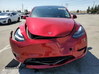 2024 Tesla Model Y Long Range with VIN 7SAYGAEE0RF016323, listed as a Copart auction lot 50253205 with 12,490 mi miles and Salvage title. Bid and sale history available at DreamBid. Image 5.