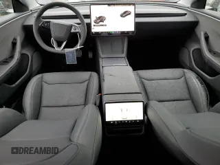 2025 Tesla Model 3 Long Range z VIN 5YJ3E1EA2SF962214, wystawiony jako Copart lot #48961935 z przebiegiem 409 mil mil oraz Szkoda całkowita • Salvage title. Historia ofert i sprzedaży dostępna na DreamBid. Obrazek 8.