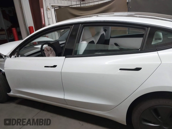 2024 Tesla Model 3 with VIN 5YJ3E1EA9RF836300, listed as a IAAI auction lot 41988009 with 9,989 mi miles. Bid and sale history available at carsss.com. Image 15.