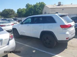 2014 Jeep Grand Cherokee Laredo with VIN 1C4RJFAG9EC334021, listed as a IAAI auction lot 42128823 with 161,741 mi miles. Bid and sale history available at carsss.com. Image 14.