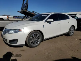 2009 Lincoln MKS with VIN 1LNHM94R59G611484, listed as a Copart auction lot 43998775 with 118,706 mi miles and Salvage Title. Bid and sale history available at carsss.com. Image 1.