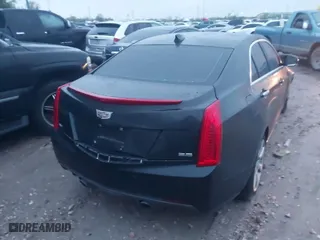 2015 Cadillac ATS Luxury with VIN 1G6AB5R35F0121403, listed as a IAAI auction lot 41823829 with 194,632 mi miles. Bid and sale history available at carsss.com. Image 4.