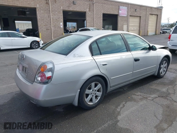 2002 Nissan Altima S with VIN 1N4AL11D62C717139, listed as a IAAI auction lot 41569217 with 135,200 mi miles. Bid and sale history available at carsss.com. Image 4.
