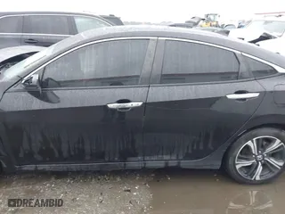 2017 Honda Civic Sedan Touring with VIN 2HGFC1F99HH658034, listed as a IAAI auction lot 41563627 with 140,819 mi miles. Bid and sale history available at carsss.com. Image 14.