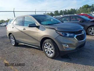 2018 Chevrolet Equinox LT z VIN 3GNAXJEV9JL115685, wystawiony jako IAAI lot #40373717 z przebiegiem 95 103 mil mil oraz . Historia ofert i sprzedaży dostępna na DreamBid. Obrazek 1.