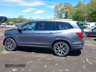 2021 Honda Pilot Touring 8-Passenger z VIN 5FNYF6H9XMB059037, wystawiony jako IAAI lot #42202410 z przebiegiem 49 267 mil mil oraz . Historia ofert i sprzedaży dostępna na DreamBid. Obrazek 14.