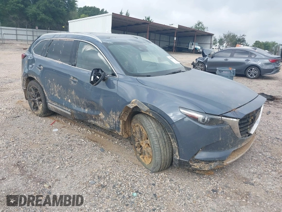 2021 Mazda CX-9 Grand Touring with VIN JM3TCADY2M0509286, listed as a IAAI auction lot 39976279 with 93,588 mi miles and . Bid and sale history available at DreamBid. Image 1.
