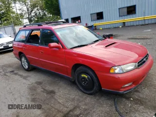 1998 Subaru Legacy GT with VIN 4S3BK6750W7320376, listed as a Copart auction lot 58223125 with 127,481 mi miles and Salvage title. Bid and sale history available at DreamBid. Image 4.