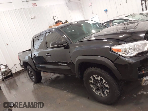 2019 Toyota Tacoma SR with VIN 5TFCZ5AN7KX167511, listed as a IAAI auction lot 42360585 with 65,213 mi miles and . Bid and sale history available at DreamBid. Image 14.