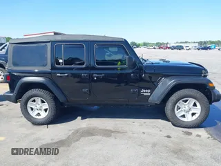 2018 Jeep Wrangler Unlimited Sport with VIN 1C4HJXDN3JW198375, listed as a IAAI auction lot 41965568 with 106,418 mi miles and . Bid and sale history available at DreamBid. Image 13.