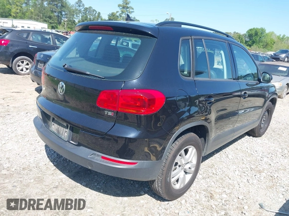 2017 Volkswagen Tiguan S with VIN WVGAV7AX7HK021496, listed as a IAAI auction lot 41968240 with 142,980 mi miles and . Bid and sale history available at DreamBid. Image 4.