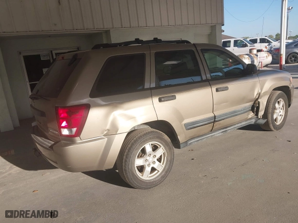 2005 Jeep Grand Cherokee Laredo with VIN 1J8HR48N95C713185, listed as a IAAI auction lot 41777242 with 95,262 mi miles. Bid and sale history available at carsss.com. Image 4.