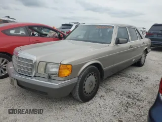 1989 Mercedes-Benz 560 with VIN WDBCA39E1KA479955, listed as a Copart auction lot 76202804 with 132,546 mi miles and Salvage Title. Bid and sale history available at DreamBid. Image 1.