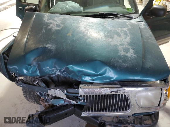 1998 Mercury Mountaineer z VIN 4M2ZU55PXWUJ01704, wystawiony jako Copart lot #50892605 z przebiegiem 196 987 mil mil oraz Szkoda całkowita • Salvage title. Historia ofert i sprzedaży dostępna na DreamBid. Obrazek 12.