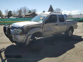 2003 Nissan Frontier SVE with VIN 1N6MD27Y53C453933, listed as a Copart auction lot 50926105 with 161,914 mi miles and Salvage title. Bid and sale history available at DreamBid. Image 1.