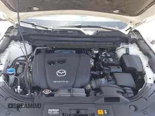 2020 Mazda CX-5 Grand Touring with VIN JM3KFADM9L0821930, listed as a IAAI auction lot 42549986 with 29,929 mi miles and . Bid and sale history available at DreamBid. Image 10.