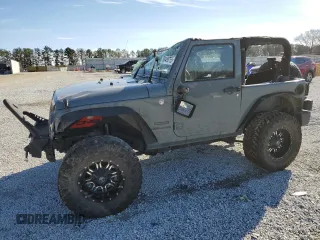 2014 Jeep Wrangler Sport z VIN 1C4AJWAG0EL119835, wystawiony jako Copart lot #88498755 z przebiegiem 151 756 mil mil oraz Szkoda całkowita • Salvage title. Historia ofert i sprzedaży dostępna na DreamBid. Obrazek 1.