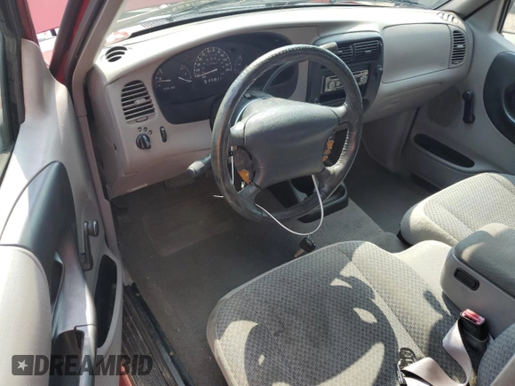 1999 Ford Ranger XL with VIN 1FTYR14V2XPB56627, listed as a Copart auction lot 57036435 with 215,050 mi miles and Salvage title. Bid and sale history available at DreamBid. Image 8.