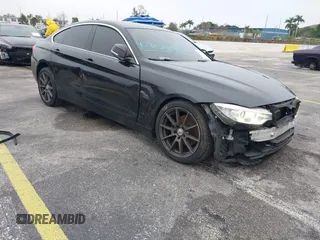 2016 BMW 4 Series 428i xDrive with VIN WBA4C9C58GG136248, listed as a IAAI auction lot 41346270 with 129,464 mi miles and . Bid and sale history available at carsss.com. Image 6.