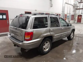 1999 Jeep Grand Cherokee Limited with VIN 1J4GW68N7XC752314, listed as a IAAI auction lot 41776905 with 228,023 mi miles. Bid and sale history available at carsss.com. Image 4.